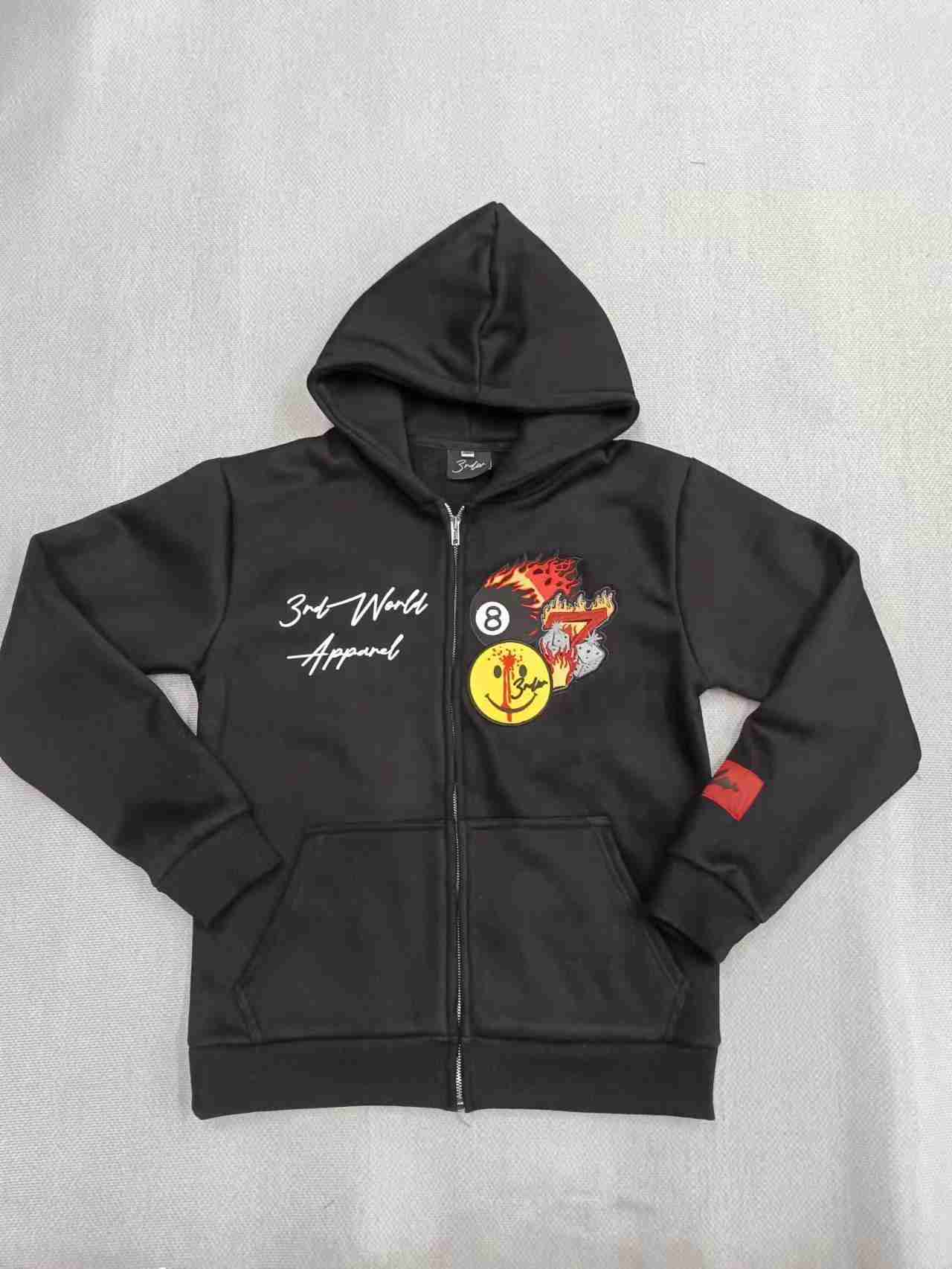 Black zip-up hoodie with grouped chest decoration beside the zipper